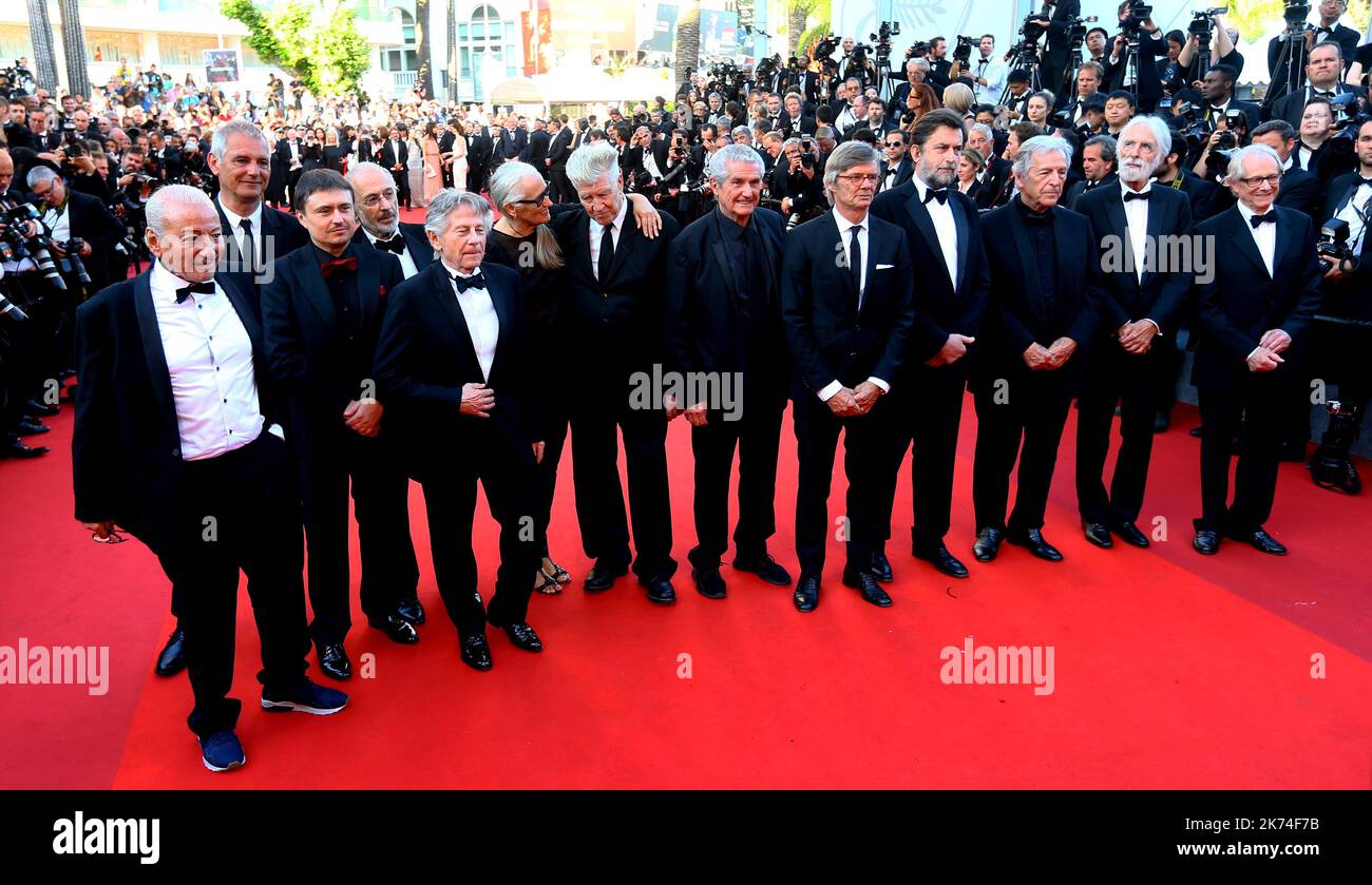 ; (FromL) Austrian director Michael Haneke, British director Ken Loach, French director Claude Lelouch, Greek director Costa-Gavras, US director Jerry Schatzberg, French-Polish director Roman Polanski, Romanian director Cristian Mungiu, New Zealander director Jane Campion, Swedish director Bille August, US director David Lynch, Italian director Nanni Moretti and French director Laurent Cantet pose as they arrive on May 23, 2017 for the '70th Anniversary' ceremony of the Cannes Film Festival in Cannes, southern France.   70th annual Cannes Film Festival in Cannes, France, May 2017. The film fe Stock Photo