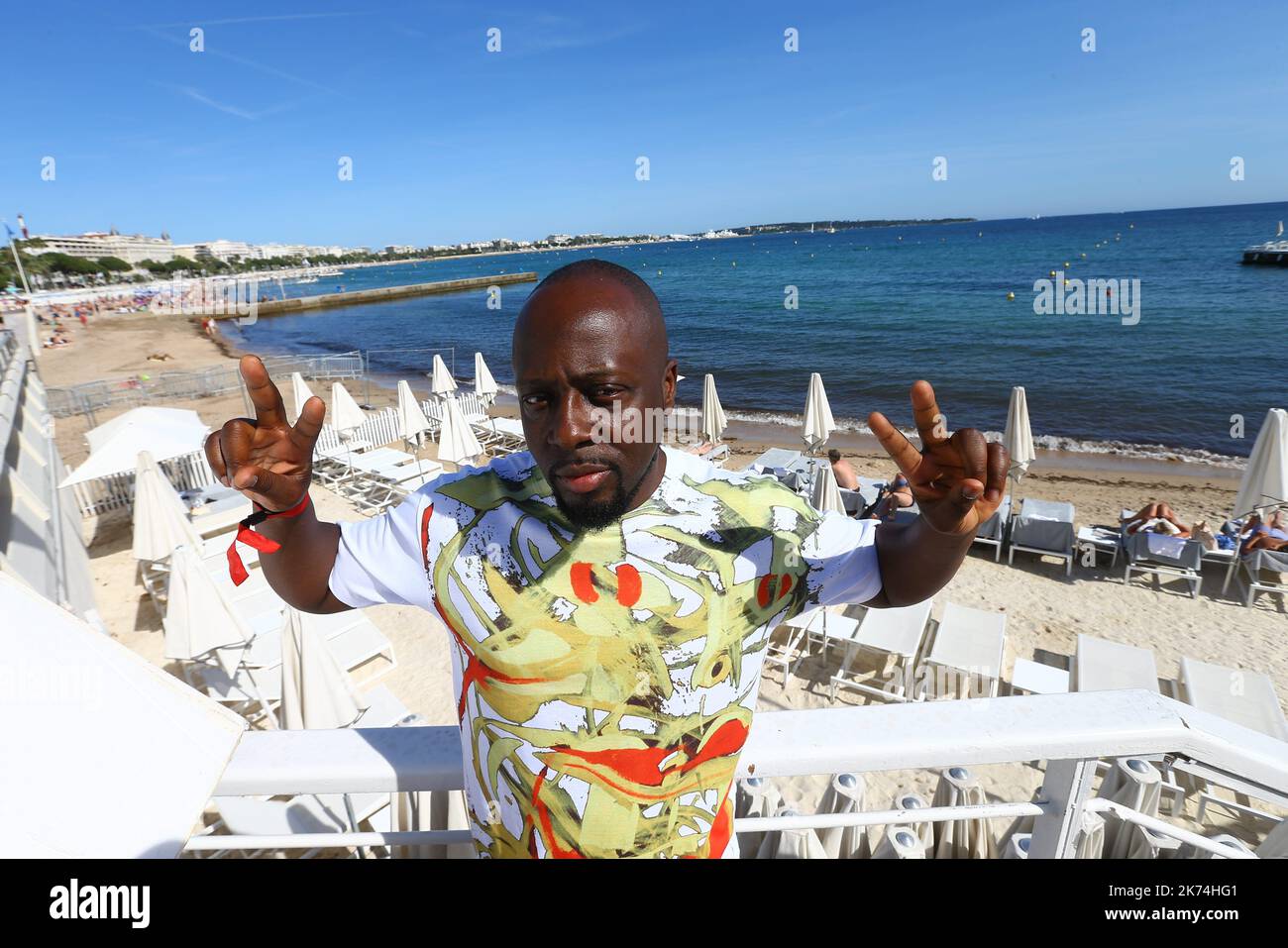 Wyclef Jean poses for a photo on the beat at Cannes during MIDEM 2017