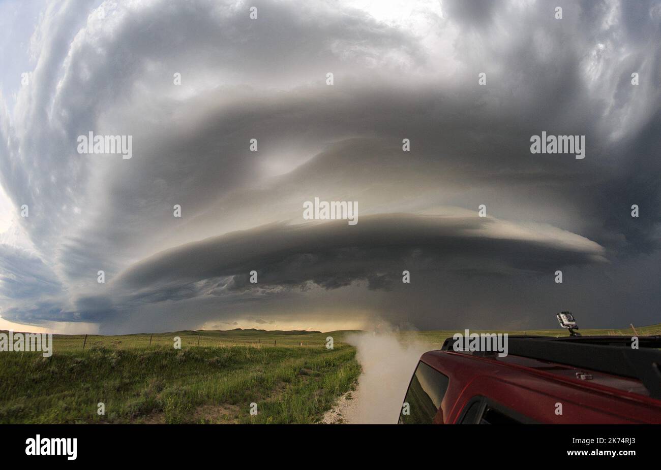 Storm chaser has captured incredible footage from the eye of America‚'s most fearsome storms after spending a month in the country‚'s notorious Tornado Alley. Lightning bolts streak across the sky and golf ball-sized hailstones crash down to earth in extraordinary video captured by Slovenian storm chaser Marko Korosec Stock Photo