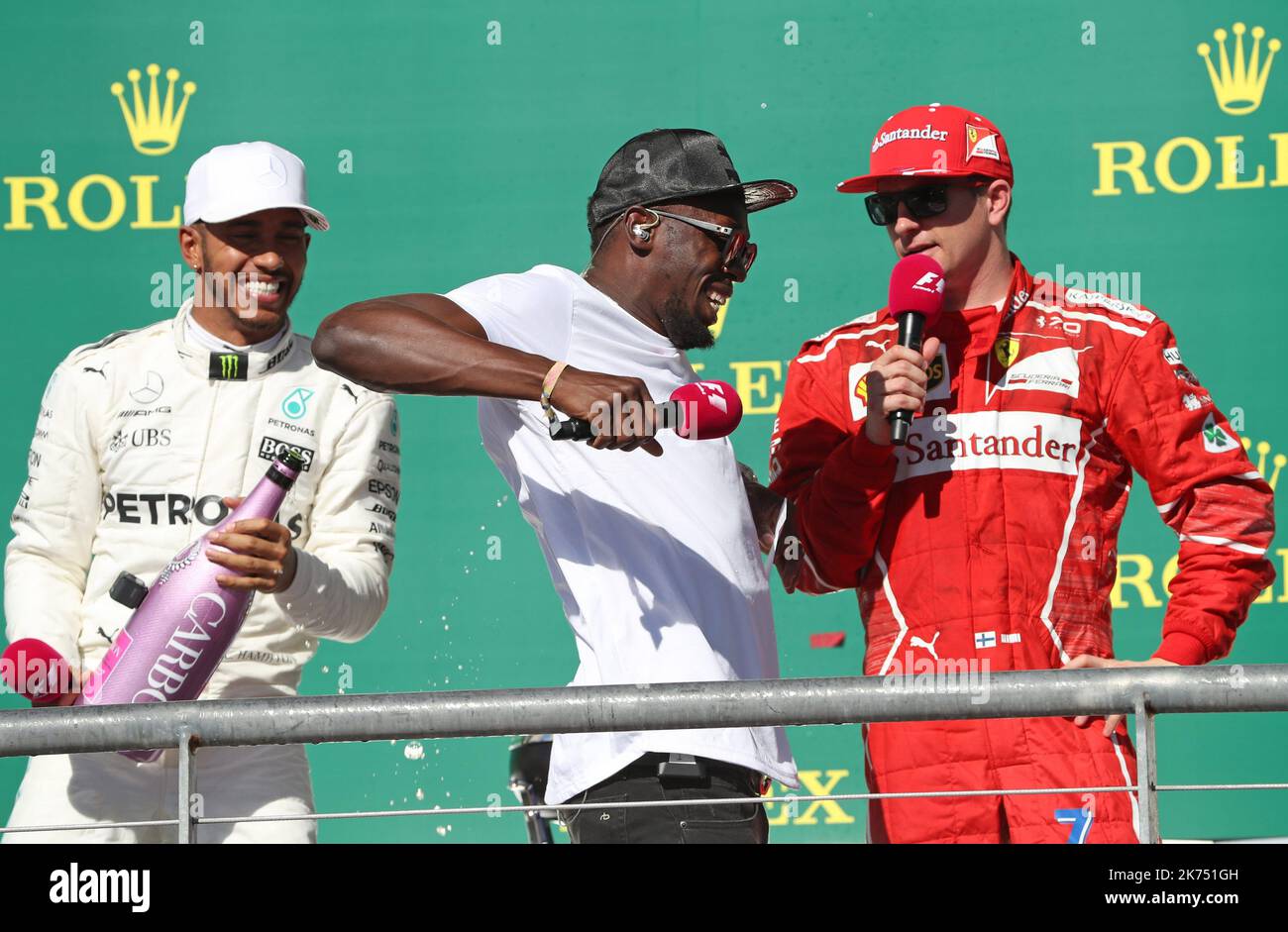 The podium (L to R): Kimi Raikkonen (FIN) Ferrari, second The podium (L to R): Kimi Raikkonen (FIN) Ferrari, second