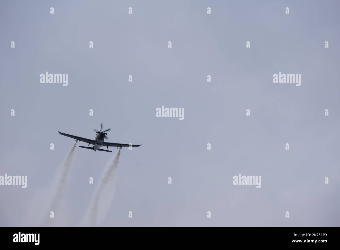 Plane with clouds hi-res stock photography and images - Alamy