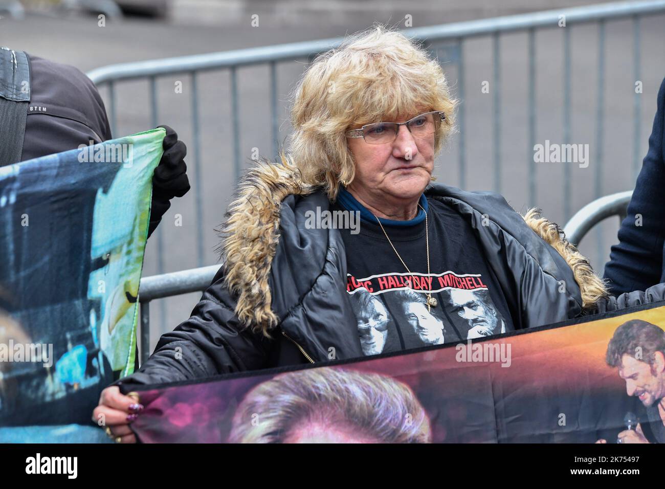 Fans of French singer and actor Johnny Hallyday and journalists gather near the house of Johnny Hallyday, in Marnes-la-Coquette on December 6, 2017 Stock Photo