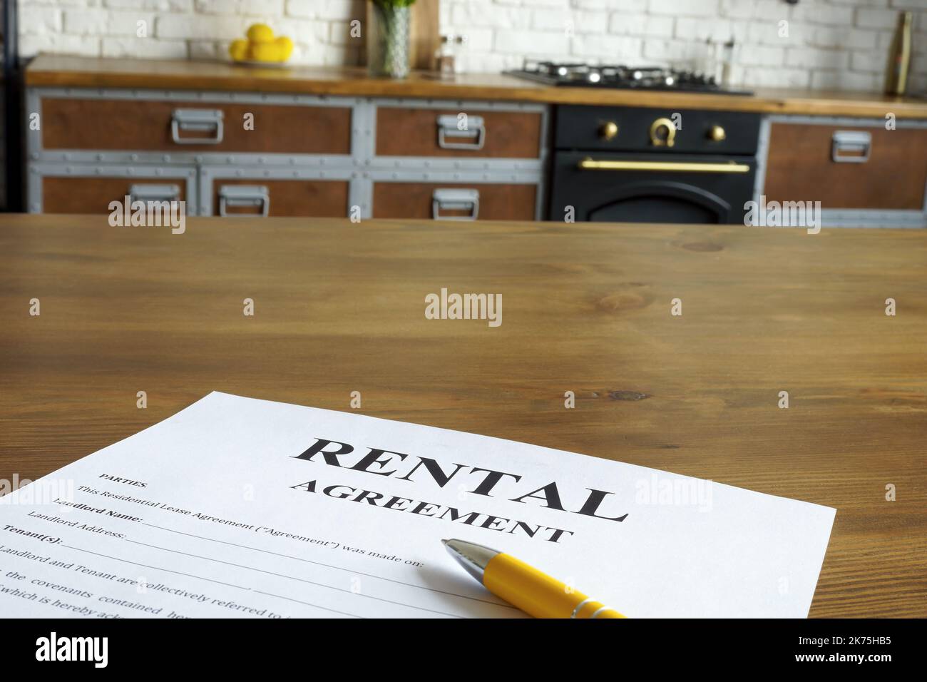 Rental agreement form on the kitchen desk. Stock Photo