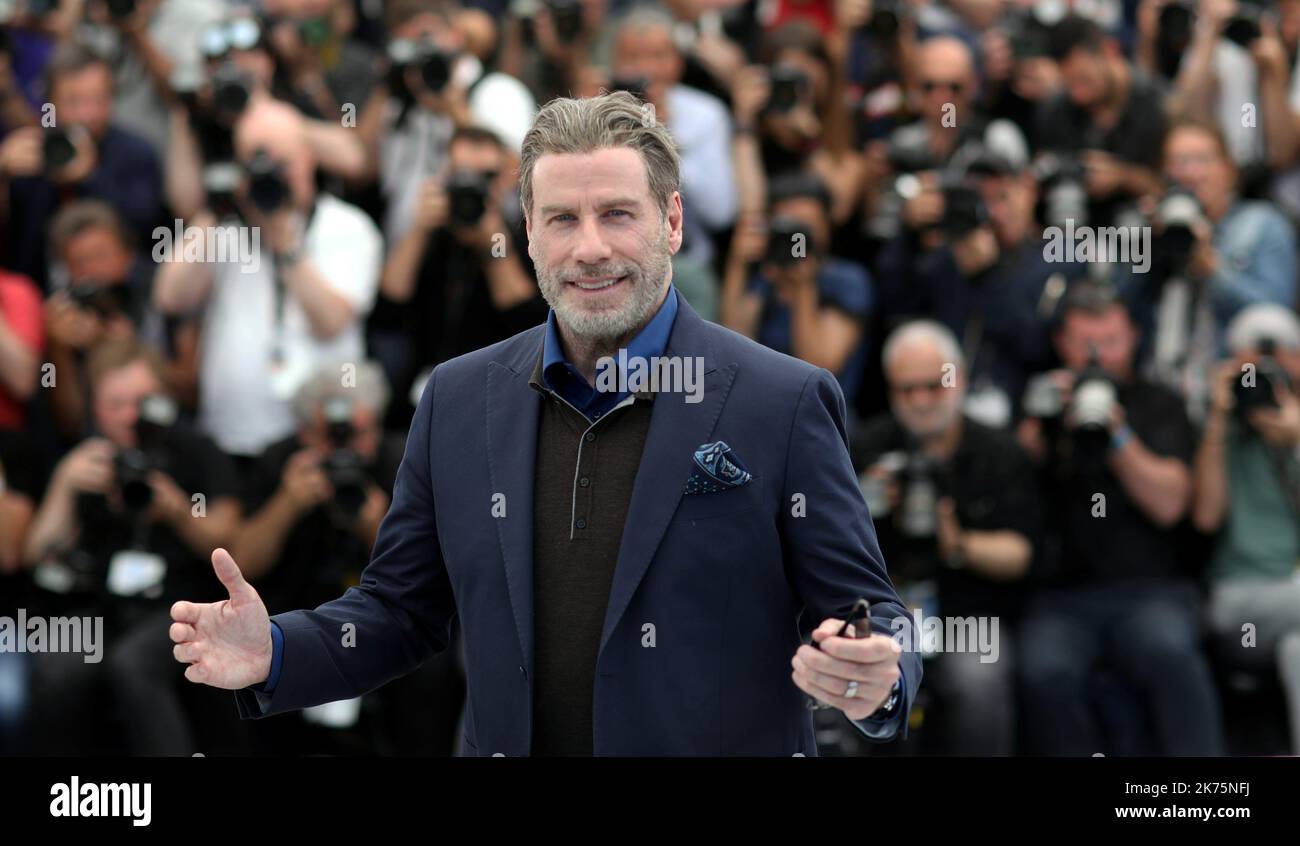 John Travolta poses during a photocall for the film Gotti at the 71st ...