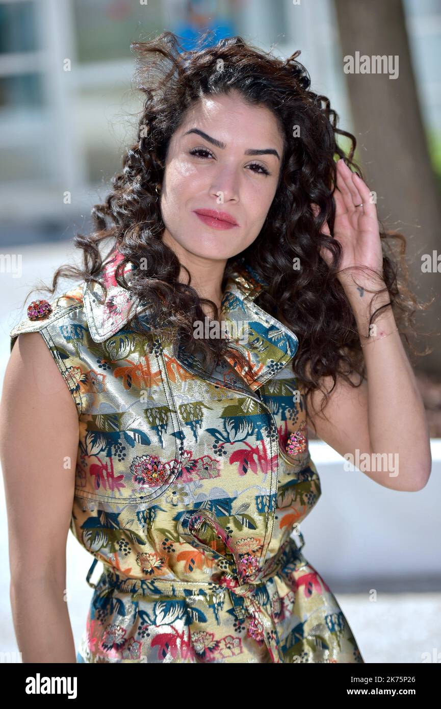 French actress and director Sabrina Ouazani attends the photocall for