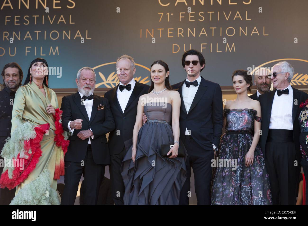 Spanish actor Jordi Molla, Spanish actress Rossy de Palma, US-British director Terry Gilliam, Swedish actor Stellan Skarsgard, French-Ukrainian actress Olga Kurylenko, US actor Adam Driver, Portuguese actress Joana Ribeiro, British actor Jonathan Pryce pose as they arrive on May 19, 2018 for the closing ceremony and the screening of the film 'The Man Who Killed Don Quixote' at the 71st edition of the Cannes Film Festival in Cannes, southern France. Stock Photo