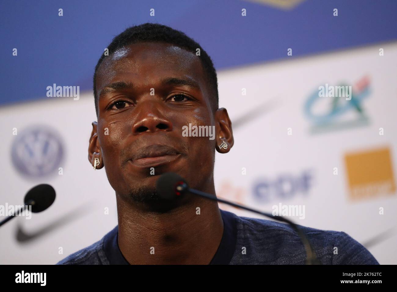 France's midfielder Paul Pogba gestures during a press conference at the press centre in Istra, west of Moscow, on July 12, 2018, ahead of their Russia 2018 World Cup final football match against Croatia.  Stock Photo