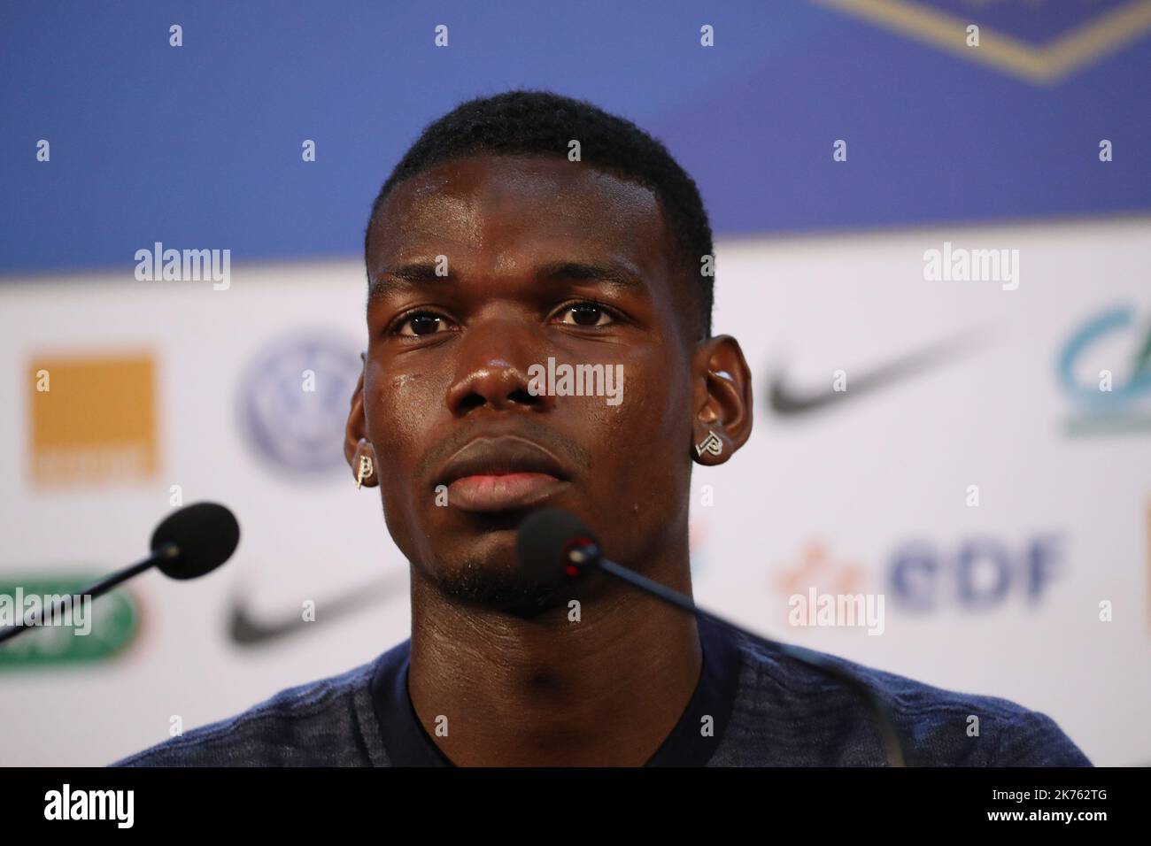 France's midfielder Paul Pogba gestures during a press conference at the press centre in Istra, west of Moscow, on July 12, 2018, ahead of their Russia 2018 World Cup final football match against Croatia.  Stock Photo