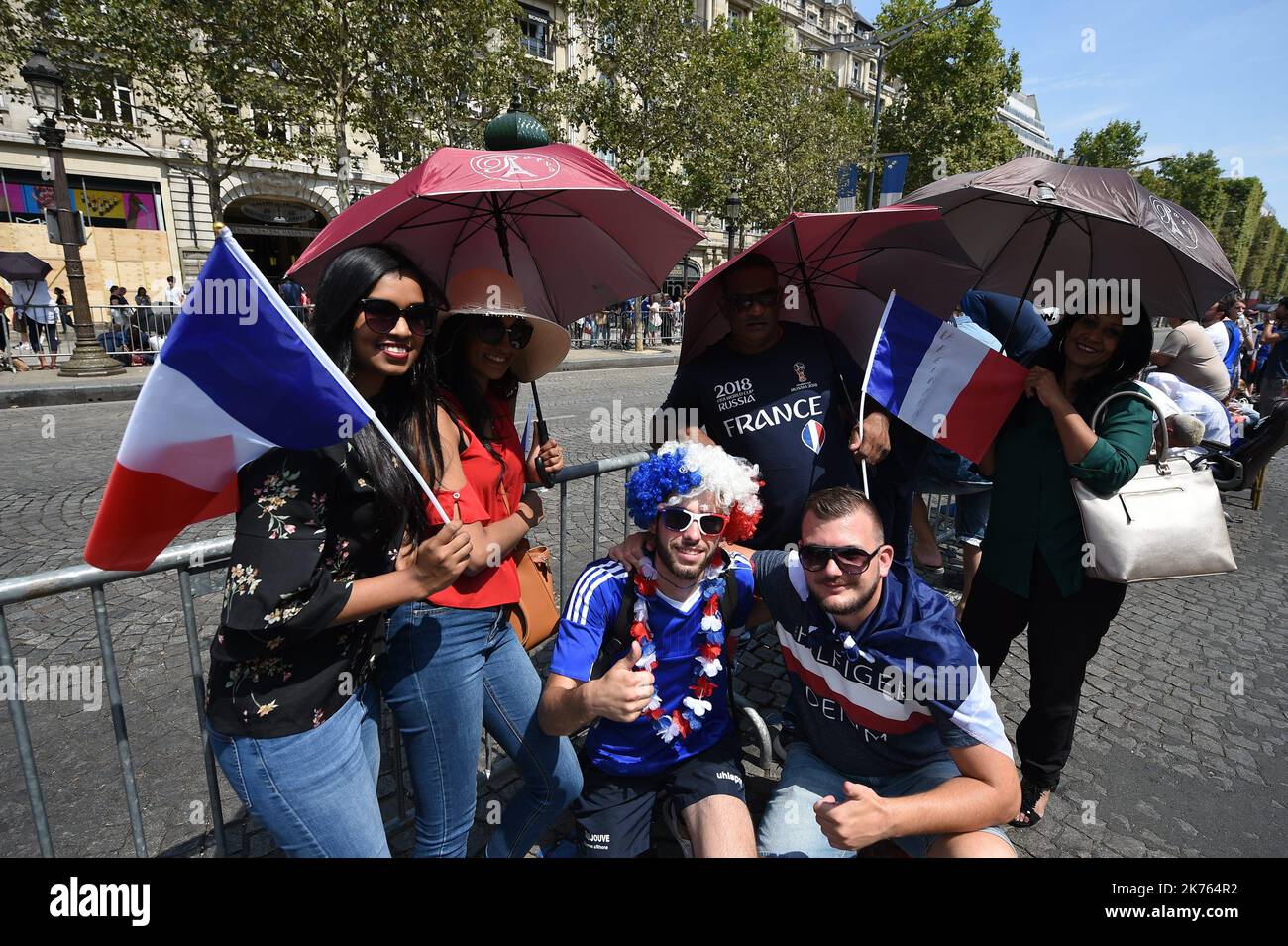 France supporters celebrate after the French National Team wins the final of the 2018 World Cup on July 15, 2018.©PHOTOPQR/VOIX DU NORD - 16 juillet 2018 ambiance  France Paris champion du monde sur les champs Ã‰lysÃ©e   . LA VOIX DU NORD PHOTOS PASCAL BONNIERE *** Local Caption ***   Stock Photo