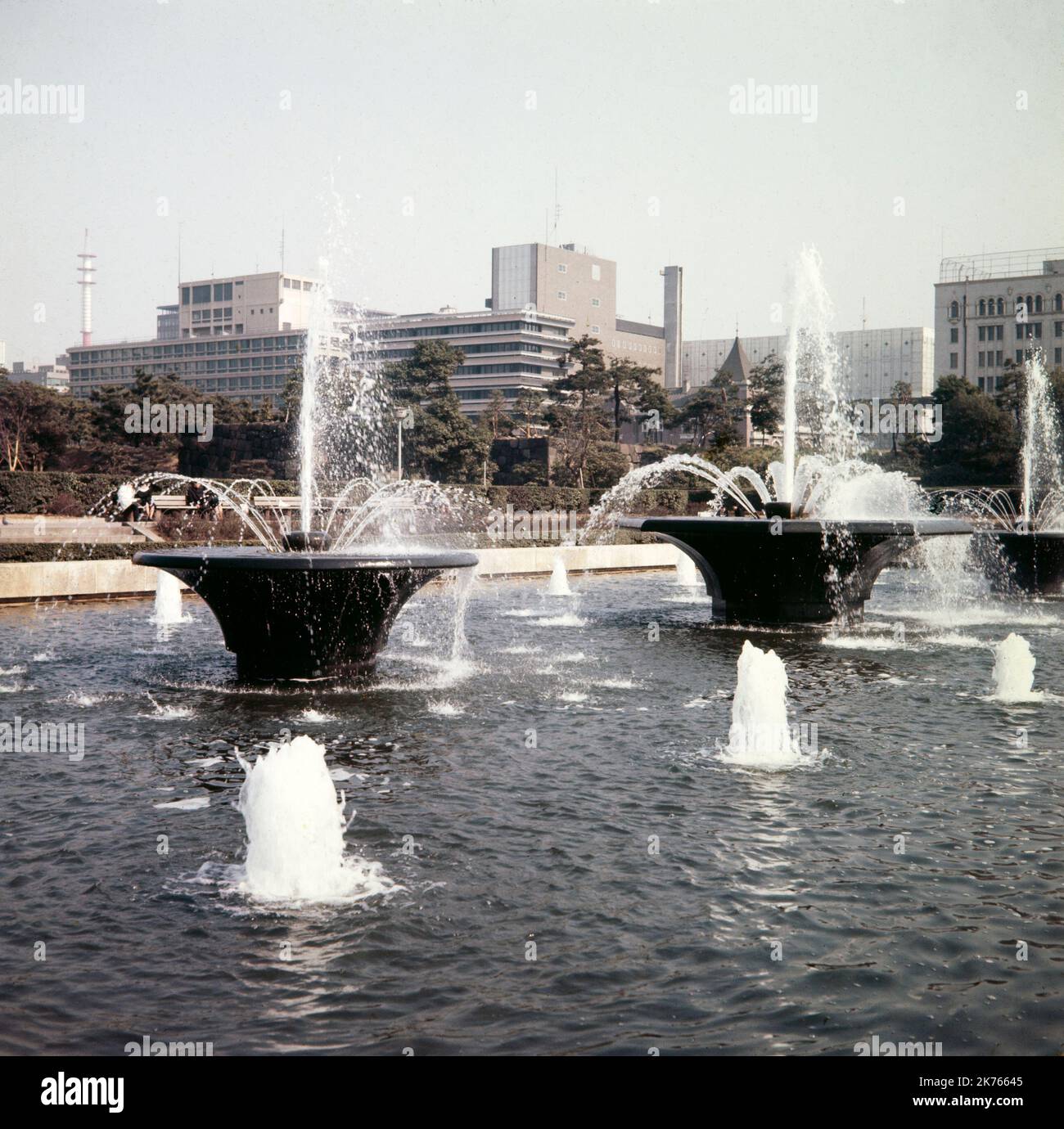 A vintage 1967 colour photograph showing the His Imperial Highness Prince Akihito fountain in The Imperial Palace, Tokyo, Japan. Stock Photo