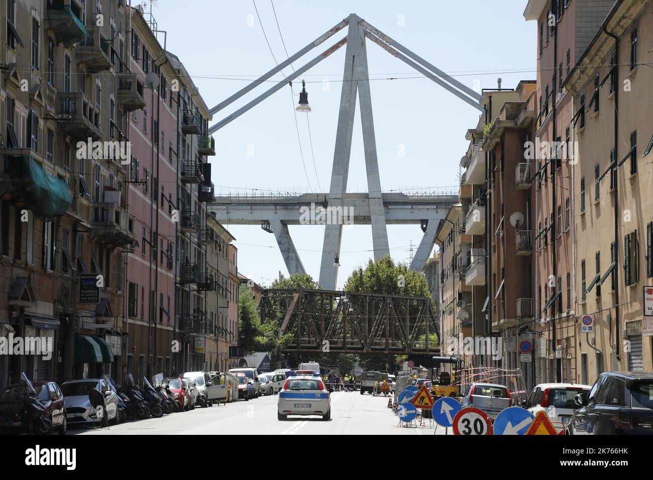A collapsed bridge over the A10 highway in Genoa, Italy, 14 August 2018. At least 30 people are believed to have died as a large section of the Morandi viaduct upon which the A10 motorway runs collapsed in Genoa on Tuesday. Stock Photo