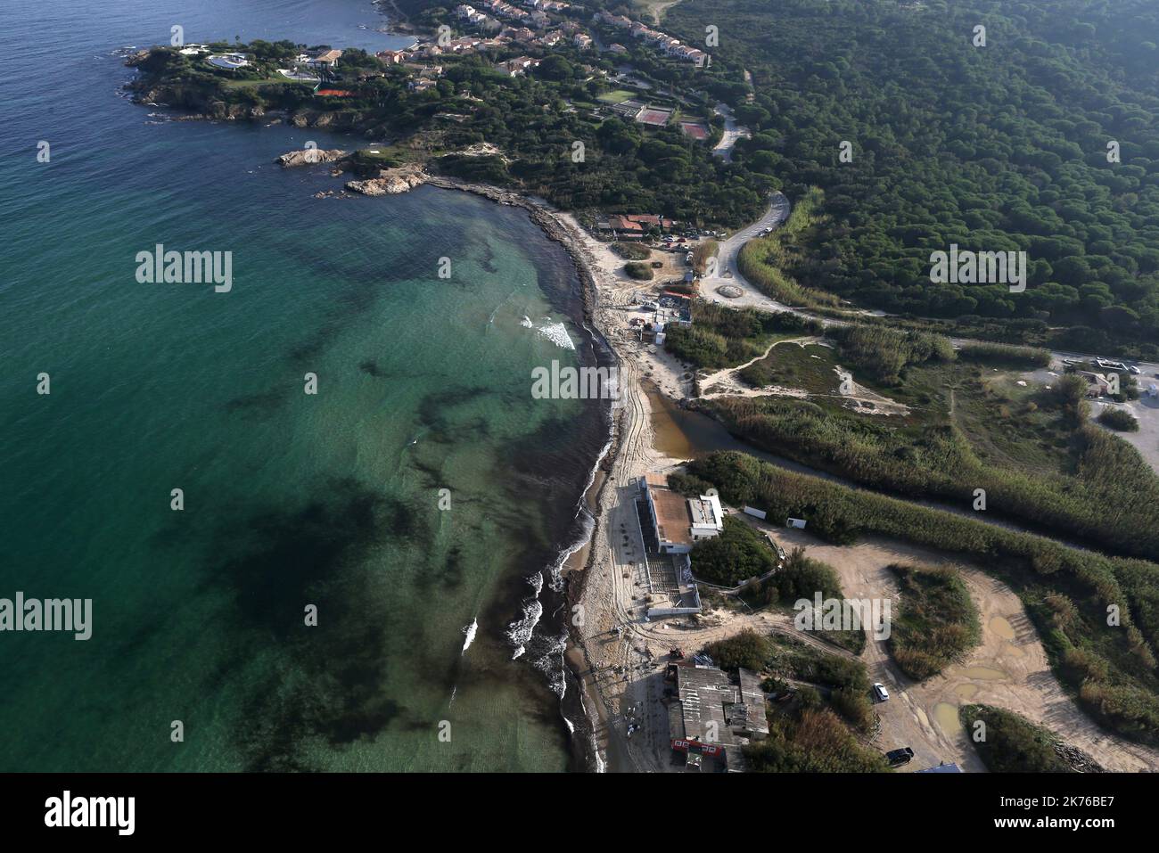 After the collision between two cargo ships off the Mediterranean island of Corsica, tar balls have been located polluting the beaches of the east of the Var, including the famous Pampelonne beach in the Gulf of Saint-Tropez on October 19, 2018. Stock Photo