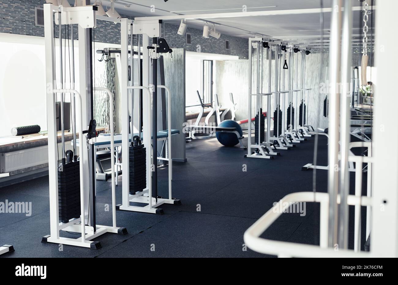 Horizontal image of modern gym with sport equipment for weightlifting Stock Photo