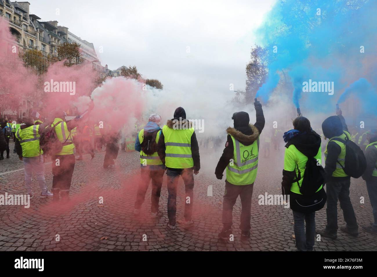Manifestation of yellow vests in Champs-Elysees in Paris Stock Photo ...