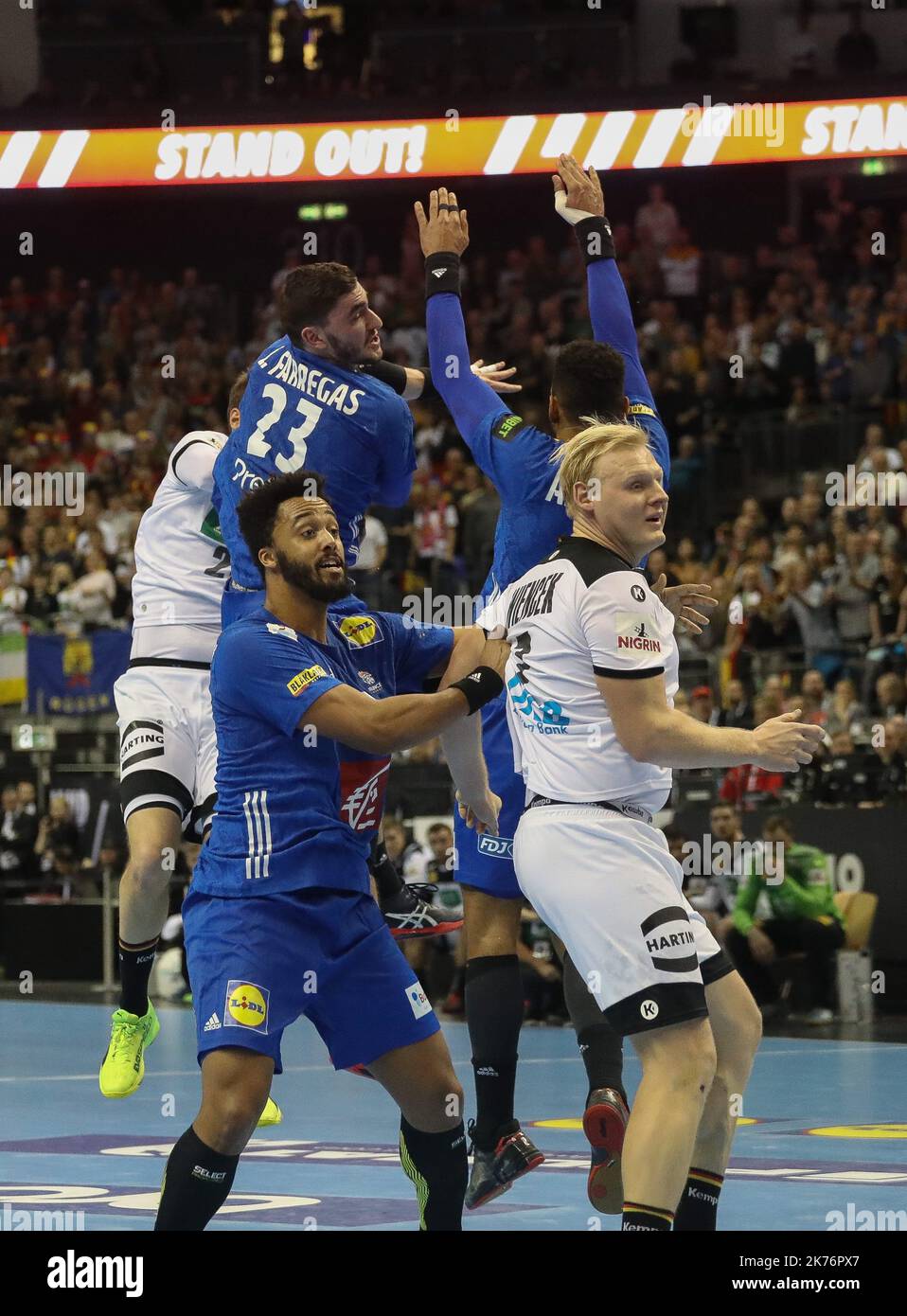 Patrick Wiencek (Germany) and Timothey N'Guessan,Adrien Dipanda,Ludovic Fabregas (France) during the IHF Men's World Championship 2019, Group A handball match between Germany and France on January 15, 2019 at Mercedes-Benz Arena in Berlin, Germany  Stock Photo
