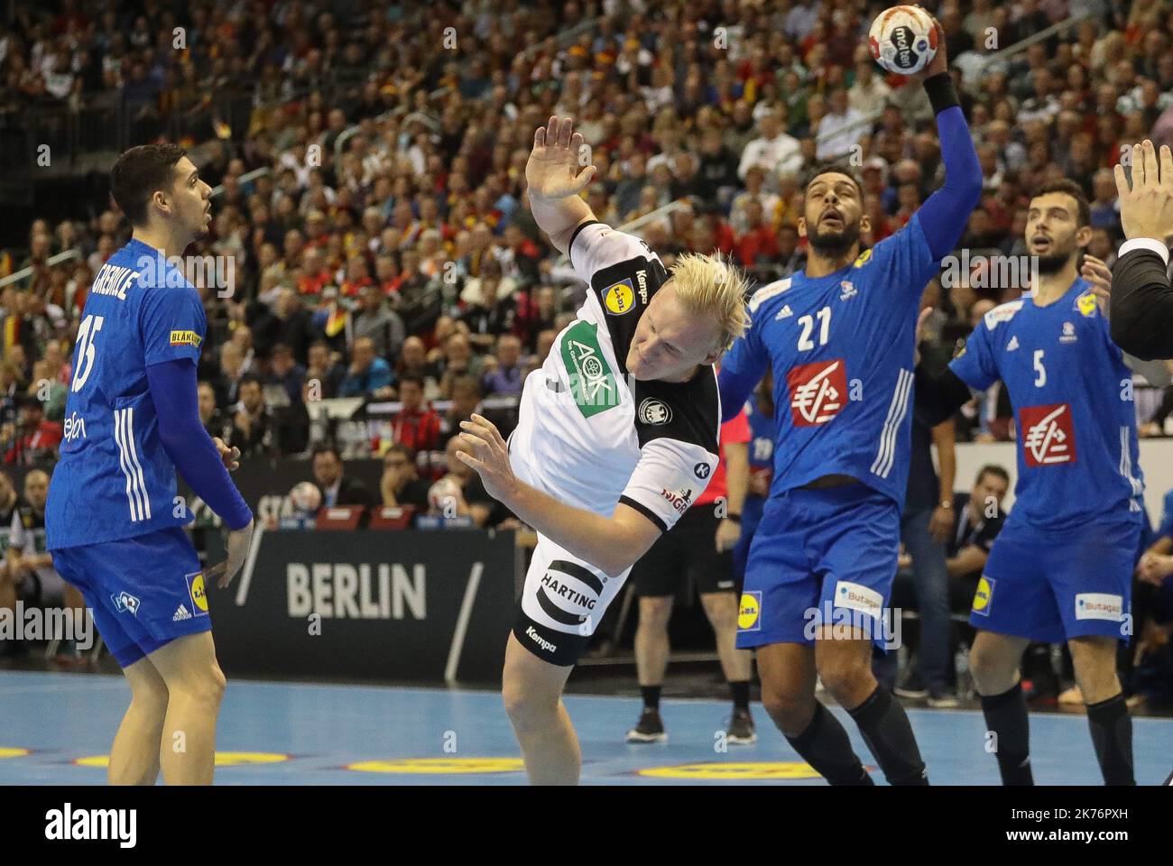 Patrick Wiencek (Germany) and Mathieu Grebille,Adrien Dipanda,Nedim Remili (France) during the IHF Men's World Championship 2019, Group A handball match between Germany and France on January 15, 2019 at Mercedes-Benz Arena in Berlin, Germany  Stock Photo