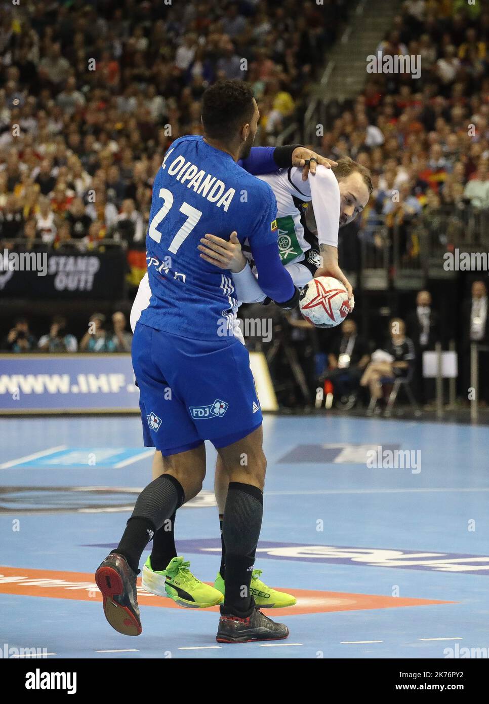Steffen Fath (Germany) and Adrien Dipanda (France) during the IHF Men's World Championship 2019, Group A handball match between Germany and France on January 15, 2019 at Mercedes-Benz Arena in Berlin, Germany  Stock Photo