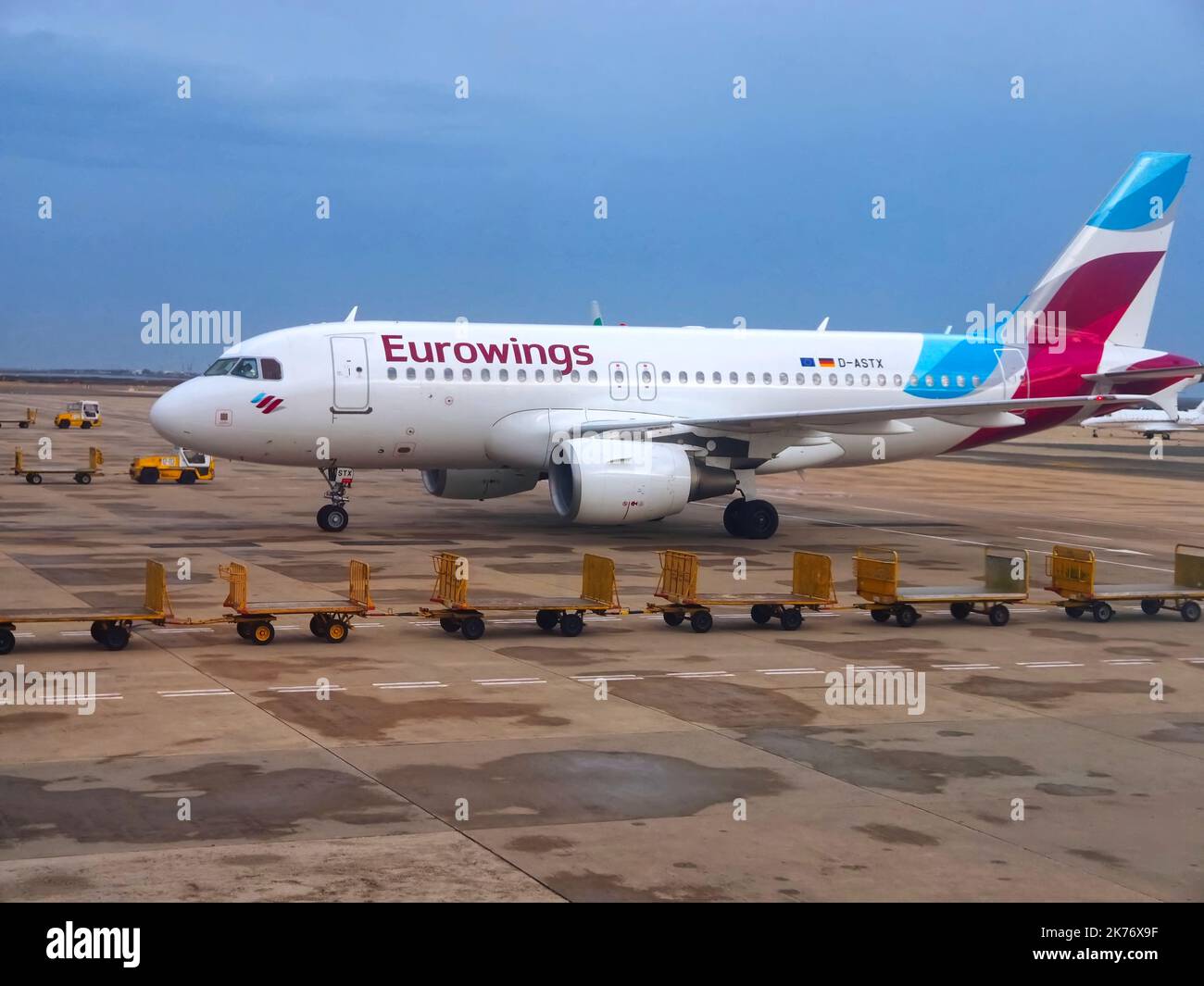 Eurowings Airplane with empty luggage trolleys Stock Photo