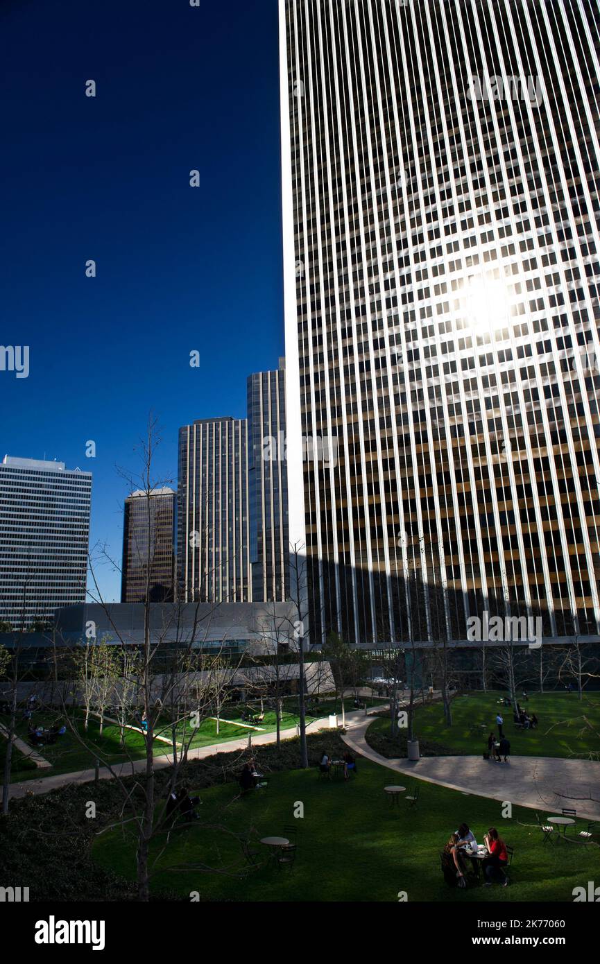 Century City Tower with Front Garden Grass and workers having lunch