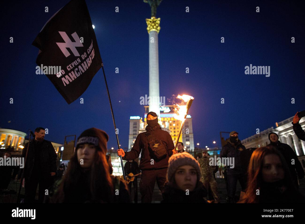 Members and sympathizers of the -Sokil-, -Sector Law- and other nationalist organizations marched through the streets of Kiev. Sokil is a sports and military society for youth that aims to develop the Ukrainian society and state on the basis of modern Ukrainian social nationalism. Stock Photo