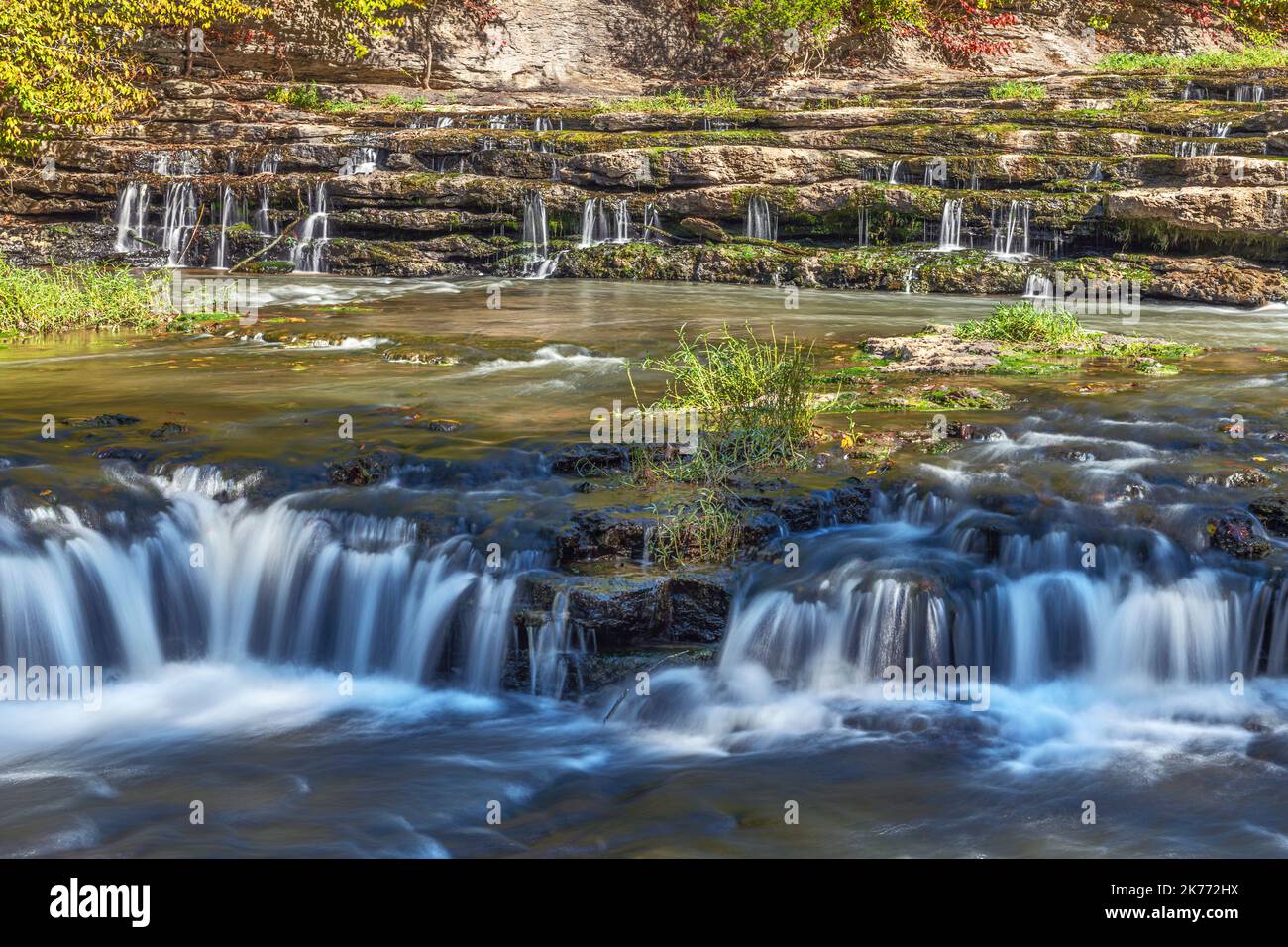 A Beautiful Stepped Waterfall Shot With A Slow Shutter Speed To Capture 