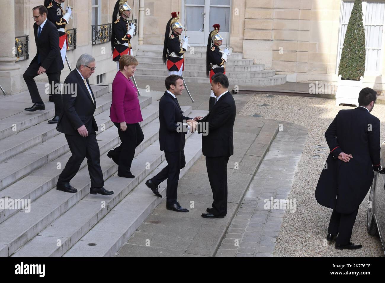 European Commission President Jean-Claude Juncker, German Chancellor Angela Merkel and French President Emmanuel Macron welcomes Chinese President Xi Jinping at the Elysee Palace in Paris, France. Stock Photo