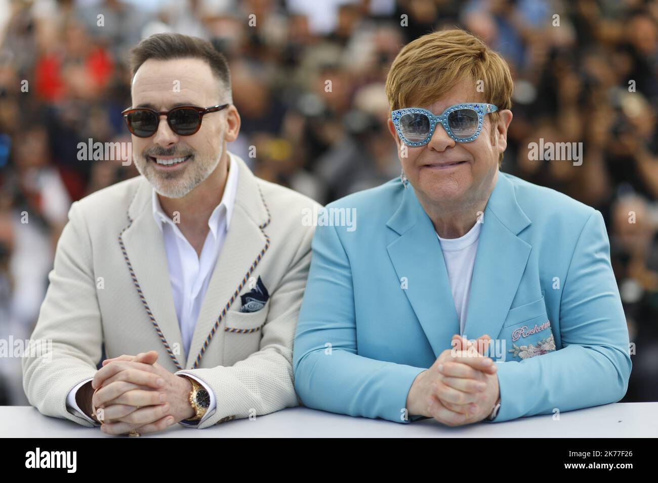 British musician and producer Elton John (R) and husband Canadian