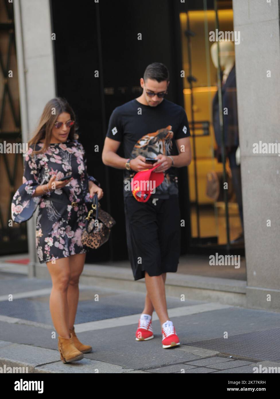 Mattia De Sciglio, defender of the JUVENTUS and the ITALIAN NATIONAL, before the rally of June 1 in Coverciano he gives himself a relaxing afternoon with his partner GIULIA. After lunch at the 'Salumaio di Montenapoleone' a walk downtown before returning home. Stock Photo