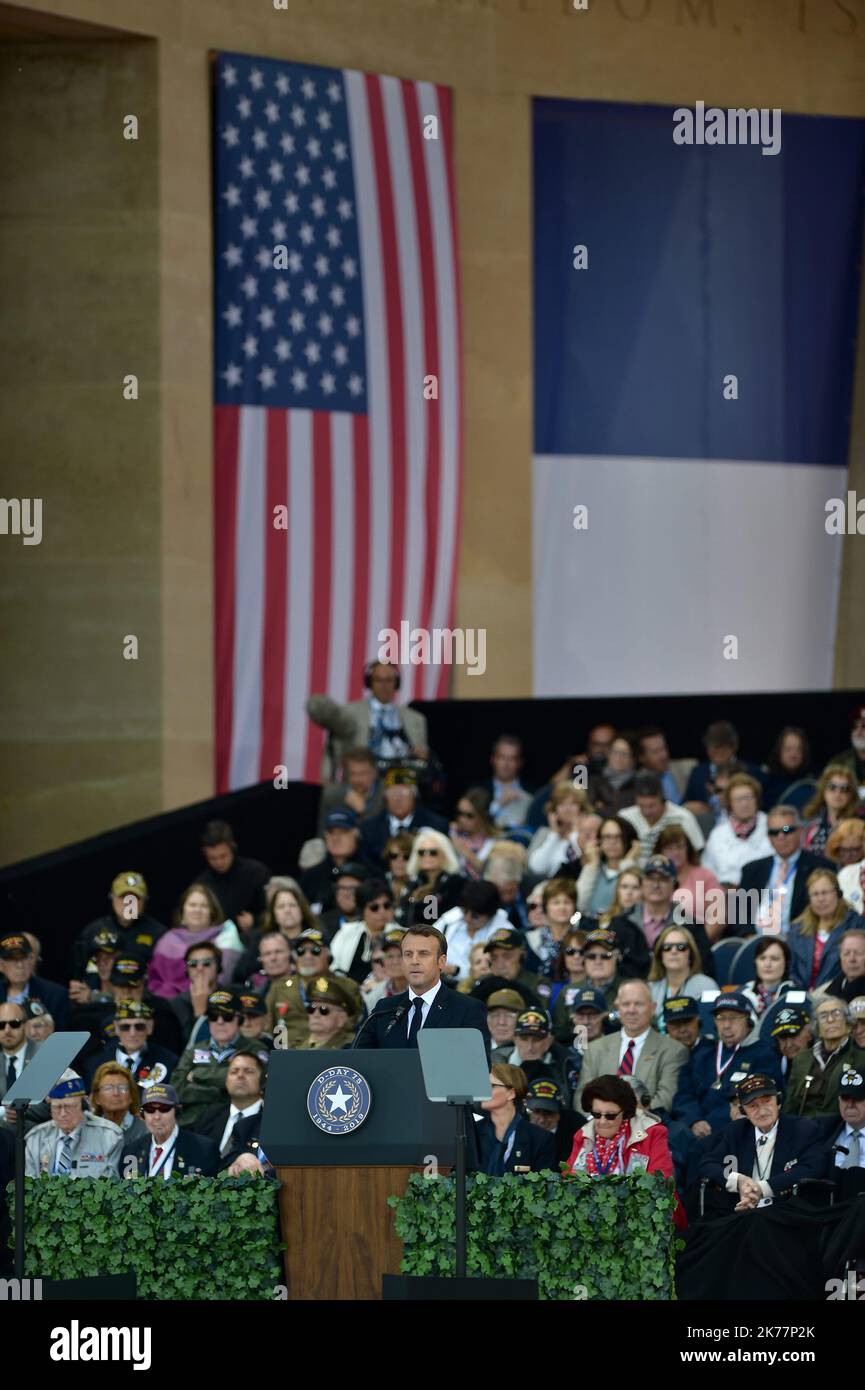 U.S. President Donald Trump and First Lady Melania Trump during their state visit to see French President Emmanuel Macron and French First Lady Brigitte Macron during a ceremony to commemorate the 75th anniversary of D-Day at the Normandy American Cemetery and Memorial in Colleville-sur-Mer, France, on Thursday, June 6, 2019. Stock Photo