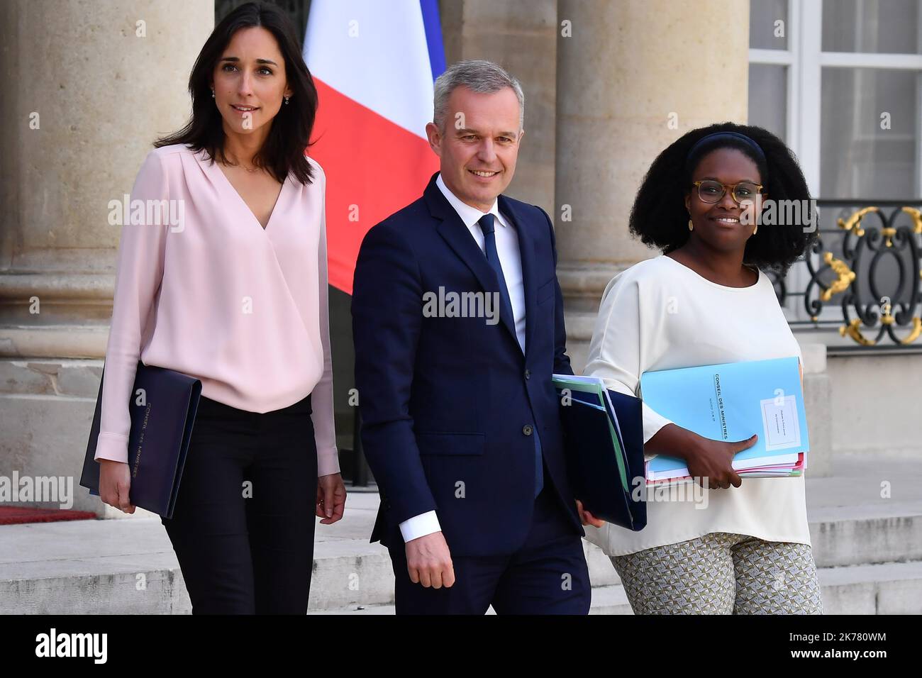 Francois de Rugy, Minister of Transition Ecology and Solidarity in the center , Brune Poirson, Secretary of State to the Minister of Transition Ecological and Solidarity (L) and Sibeth NDiaye, Secretary to the Prime Minister and Spokesman of the Government (R) leaving the Council of Ministers of 10 July 2019 Stock Photo