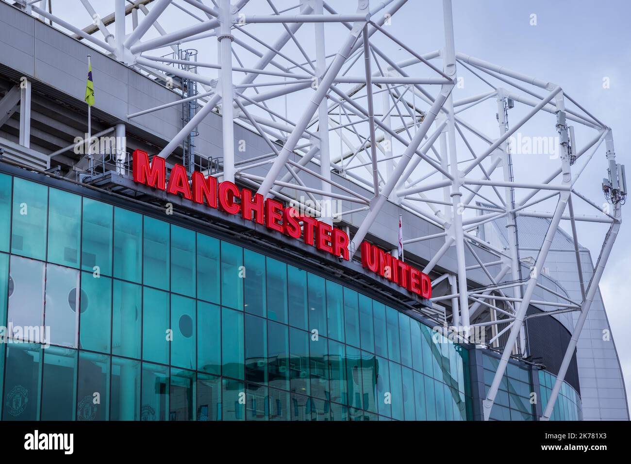 Facade of Old Trafford stadium with Manchester United's name Stock ...