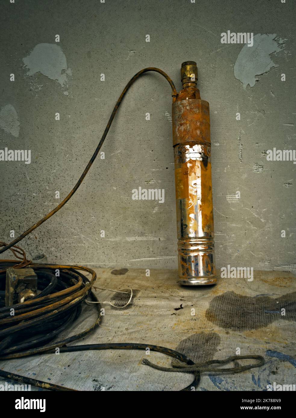 Old rusty submersible pump for drinking water Stock Photo Alamy