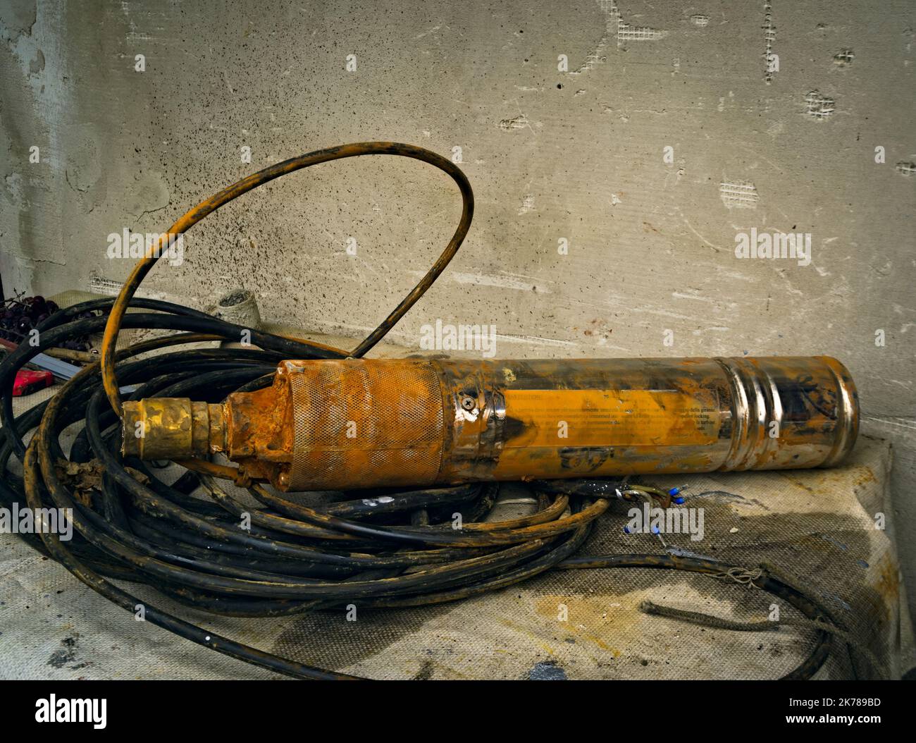 Old rusty submersible pump for drinking water Stock Photo Alamy