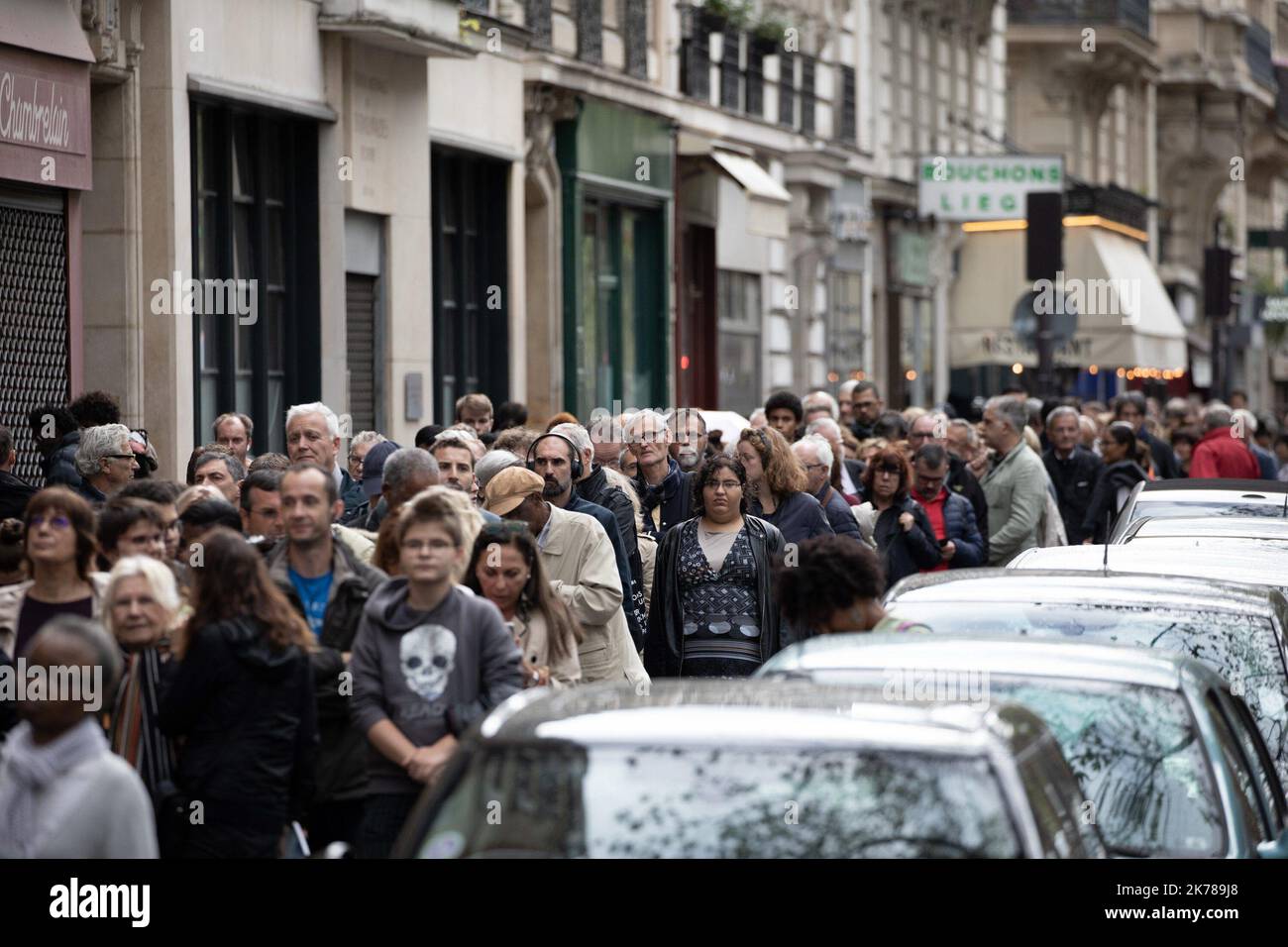People queue at the entrance of Saint-Louis-des-Invalides Cathedral ...