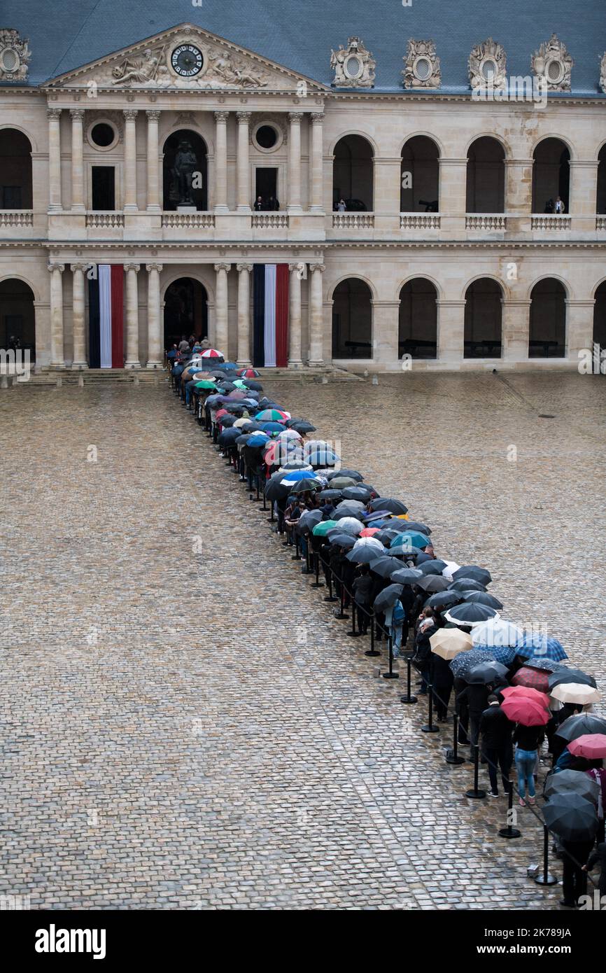 People queue at the entrance of Saint-Louis-des-Invalides Cathedral ...