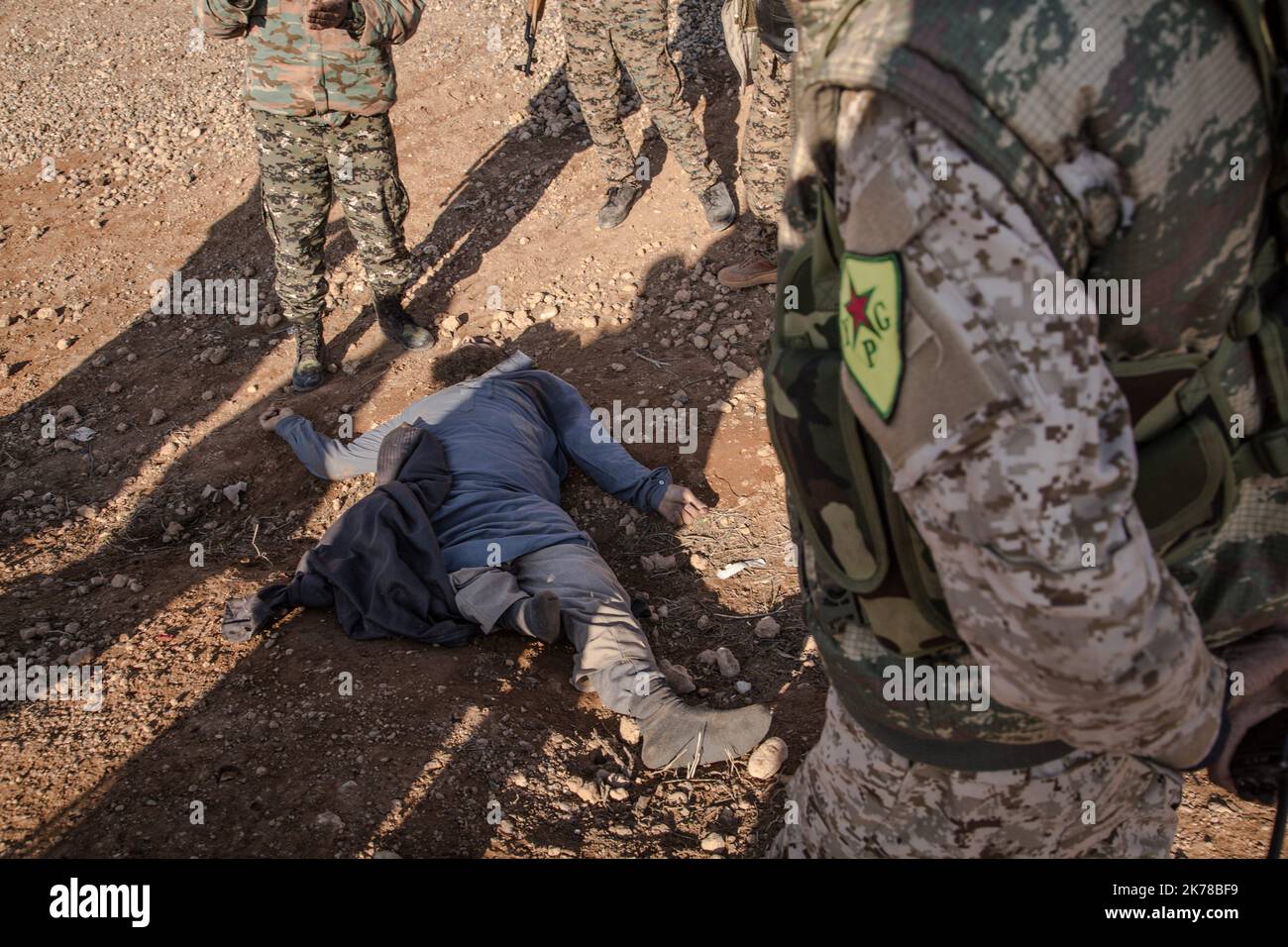 SYRIA / North Syria / SHE BHER village - A dead body of a memeber of ISIS - the YPG platoon has just liberate the village from ISIS, this place is not far from Raqqa. Stock Photo