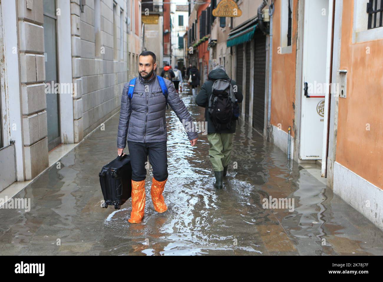 Venice underwater as exceptional tide sweeps through canals city ...