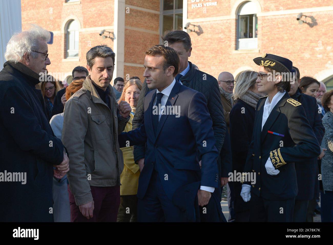 Arrival of the French President Emmanuel Macron at the new university pole of the University Jules Verne, located in the heart of the Citadel of Amiens, listed building of the early seventeenth century redesigned by the architect Renzo Piano, and meeting with the students outside and Gabriel Attal, Frederique Vidal. Then presentation of the HUB energy - Tiamat start up and GRECO innovation by Professor of the universities M. Le Franc - surgery assisted by robots, and meeting with the students of the University, on November 21, 2019 in Amiens.  Stock Photo