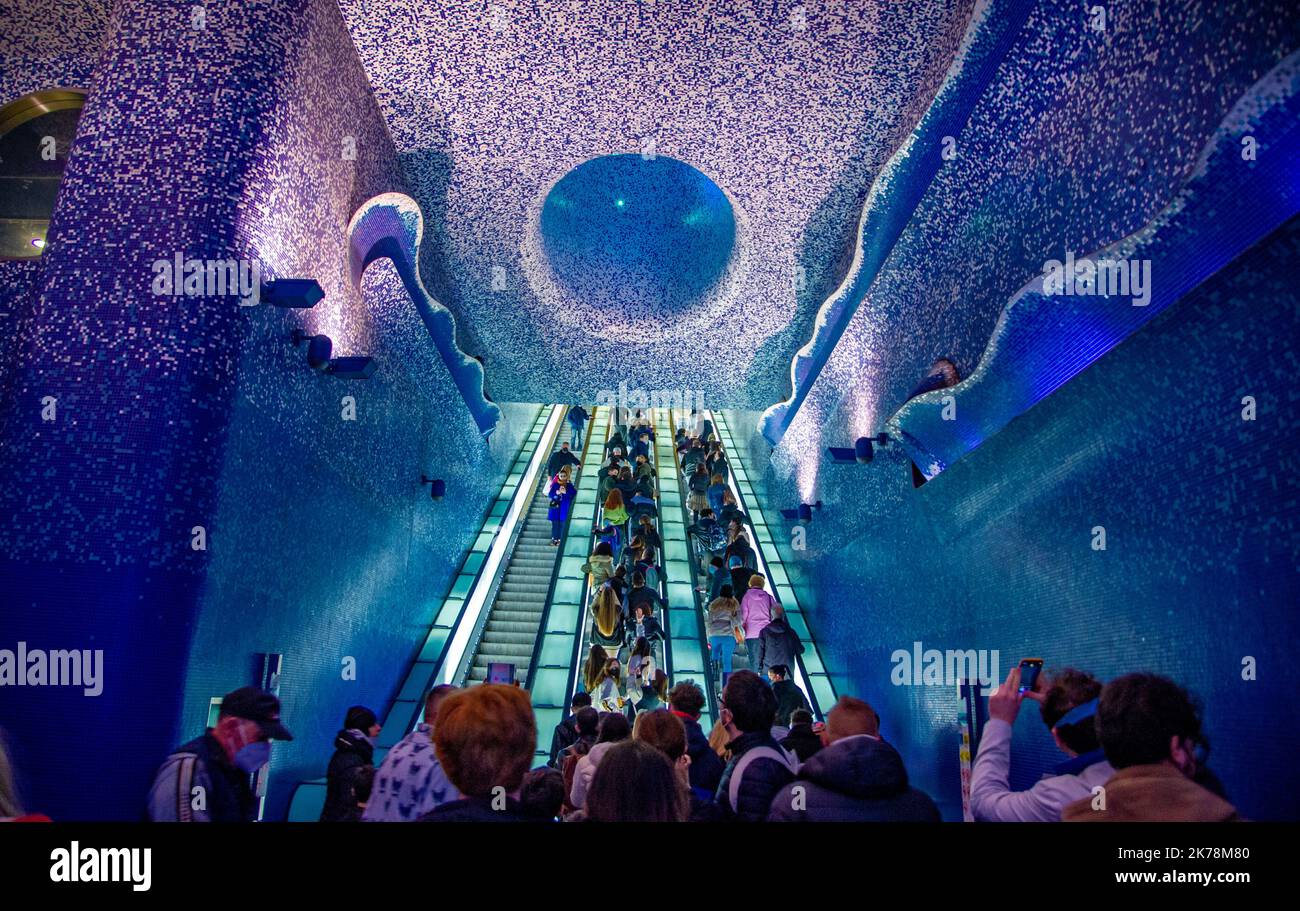 April 15 2022- One of the most beautiful metro stations in Naples with blue walls and very long escalators Stock Photo