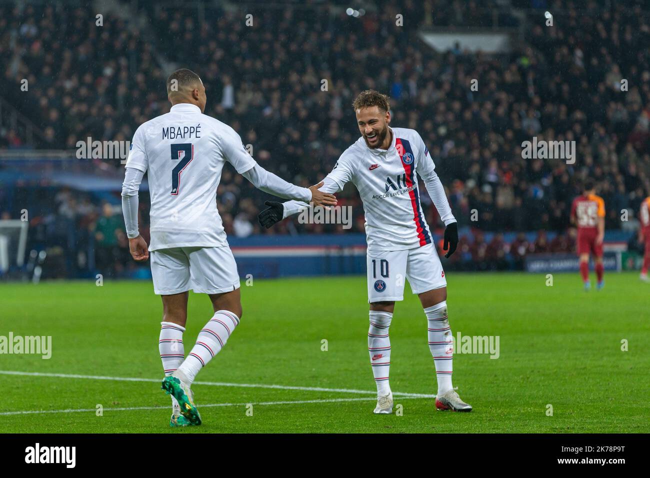 Paris Saint Germain's Kylian Mbappe celebrates scoring his side's fourth goal of the game with his team mates Stock Photo