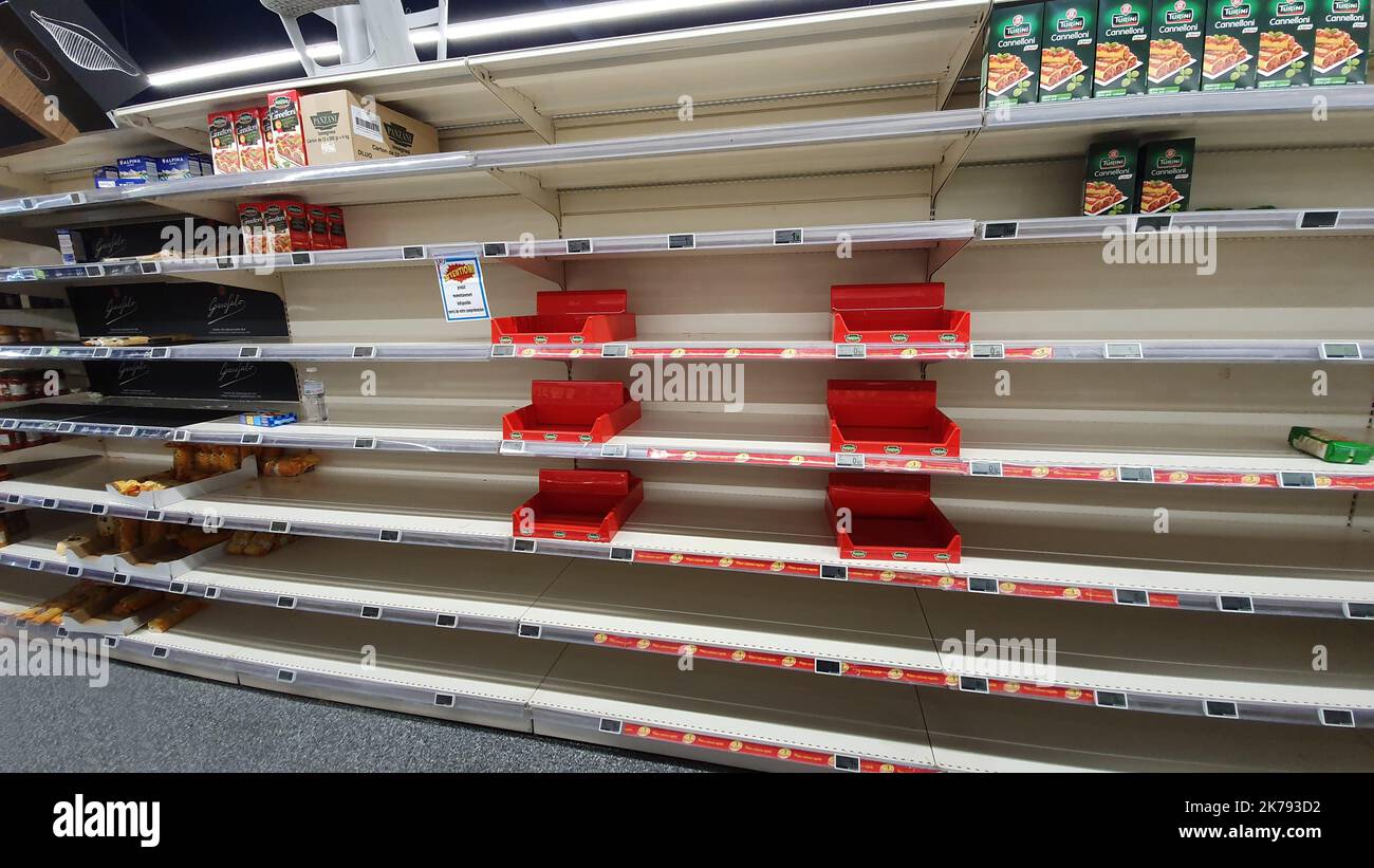 Supermarket shelves at Leclerc in Lille-Fives start to run low on supplies as customers start to stock up on non perishable foods Stock Photo