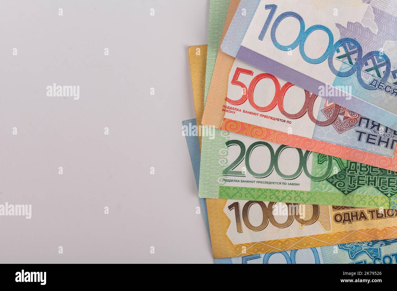 Kazakhstan money - tenge. 500, 1000, 2000, 5000, 10000 banknotes. Close up of tenge on white background. Stock Photo