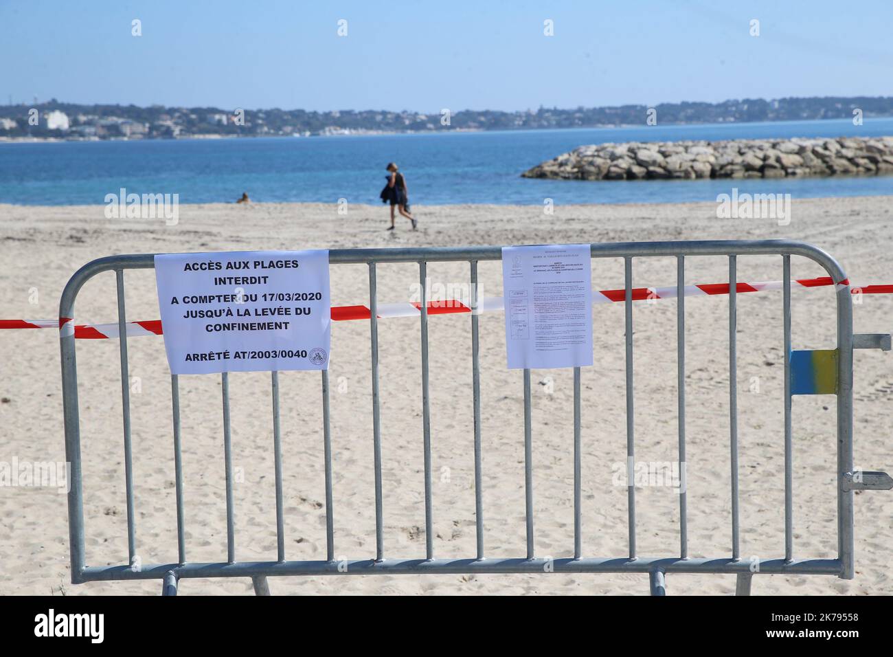 A general view of the French Riviera beach as a ban on access to the beaches of Golfe-Juan Vallauris is introduced due to the Coronavirus epidemic Stock Photo