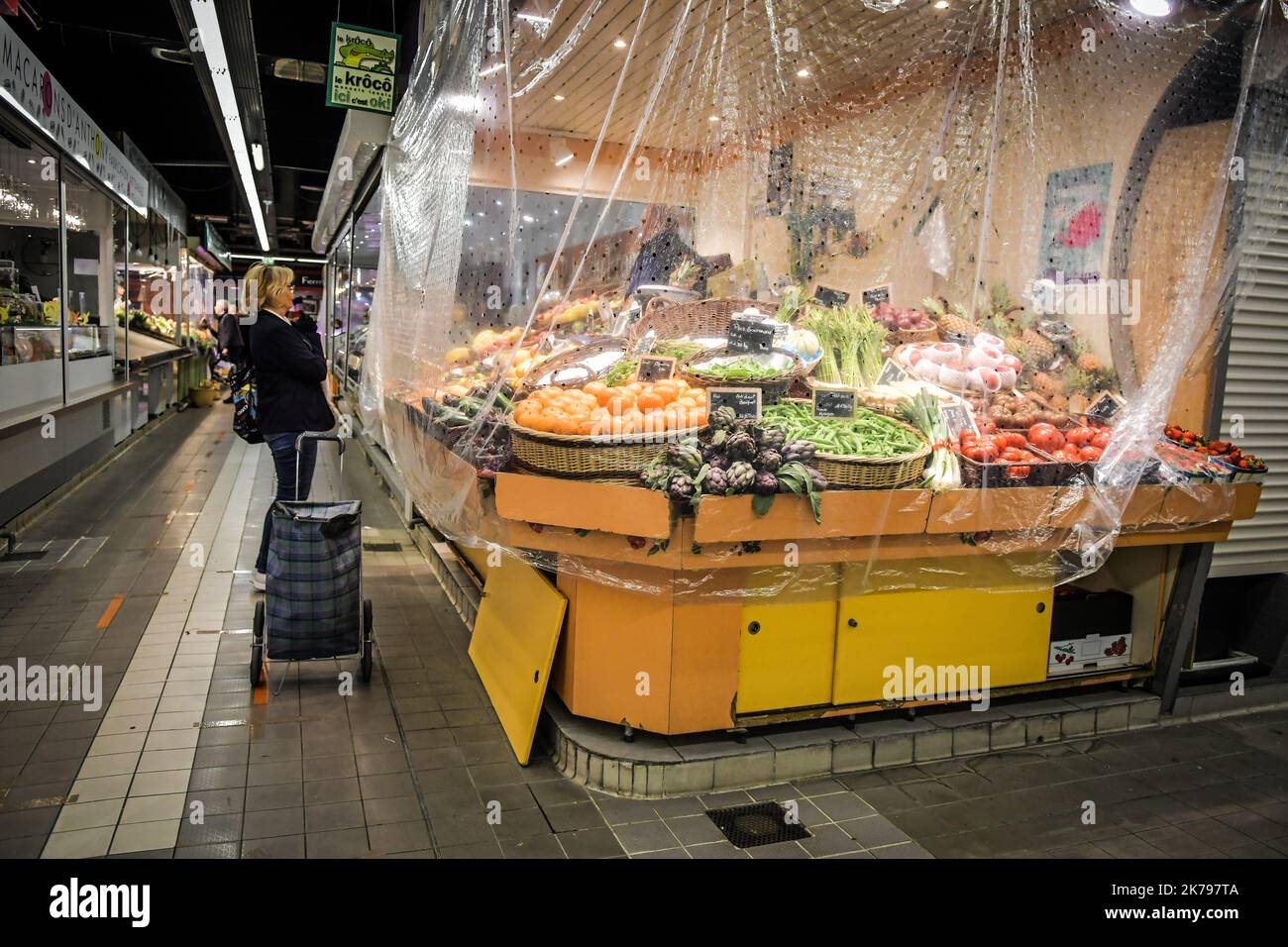 Les Halles food market in Nimes, France whose access is limited to 100 ...