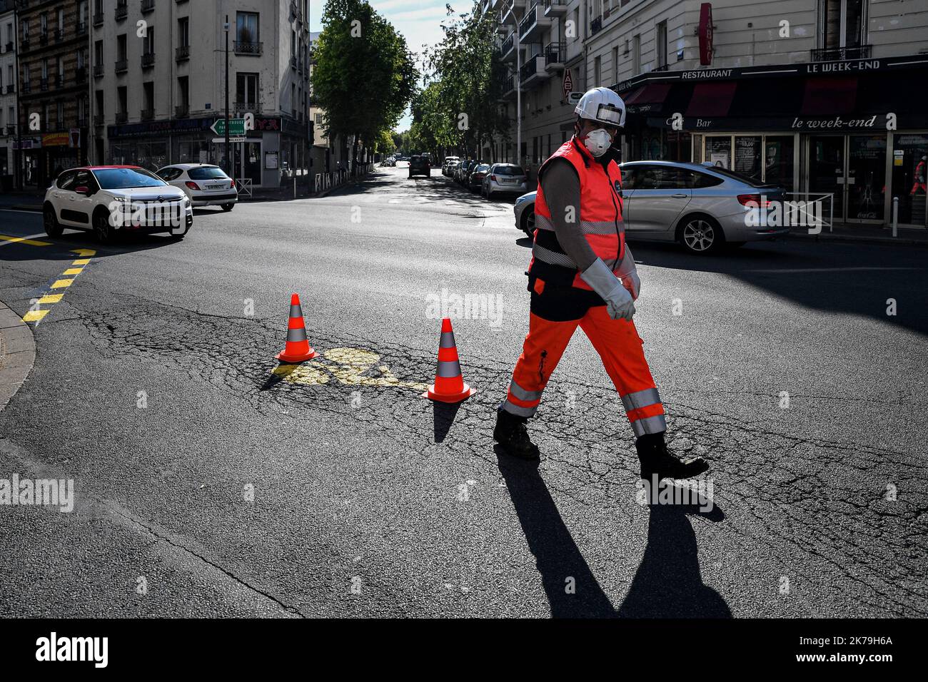 Â©Julien Mattia / Le Pictorium/MAXPPP - In the fight against the Covid-19 Crisis, agents from the company Signature paint the new road markings for temporary cycle paths, the only alternative means of public transport, in Malakoff on May 06, 2020. Stock Photo