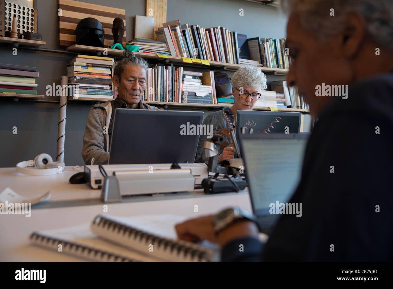 Group working on laptops hi-res stock photography and images - Alamy