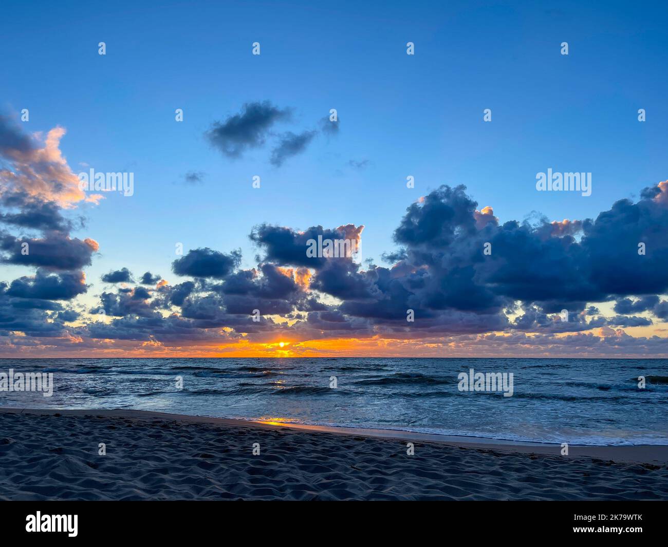Wavy shore sunset in hi-res stock photography and images - Alamy