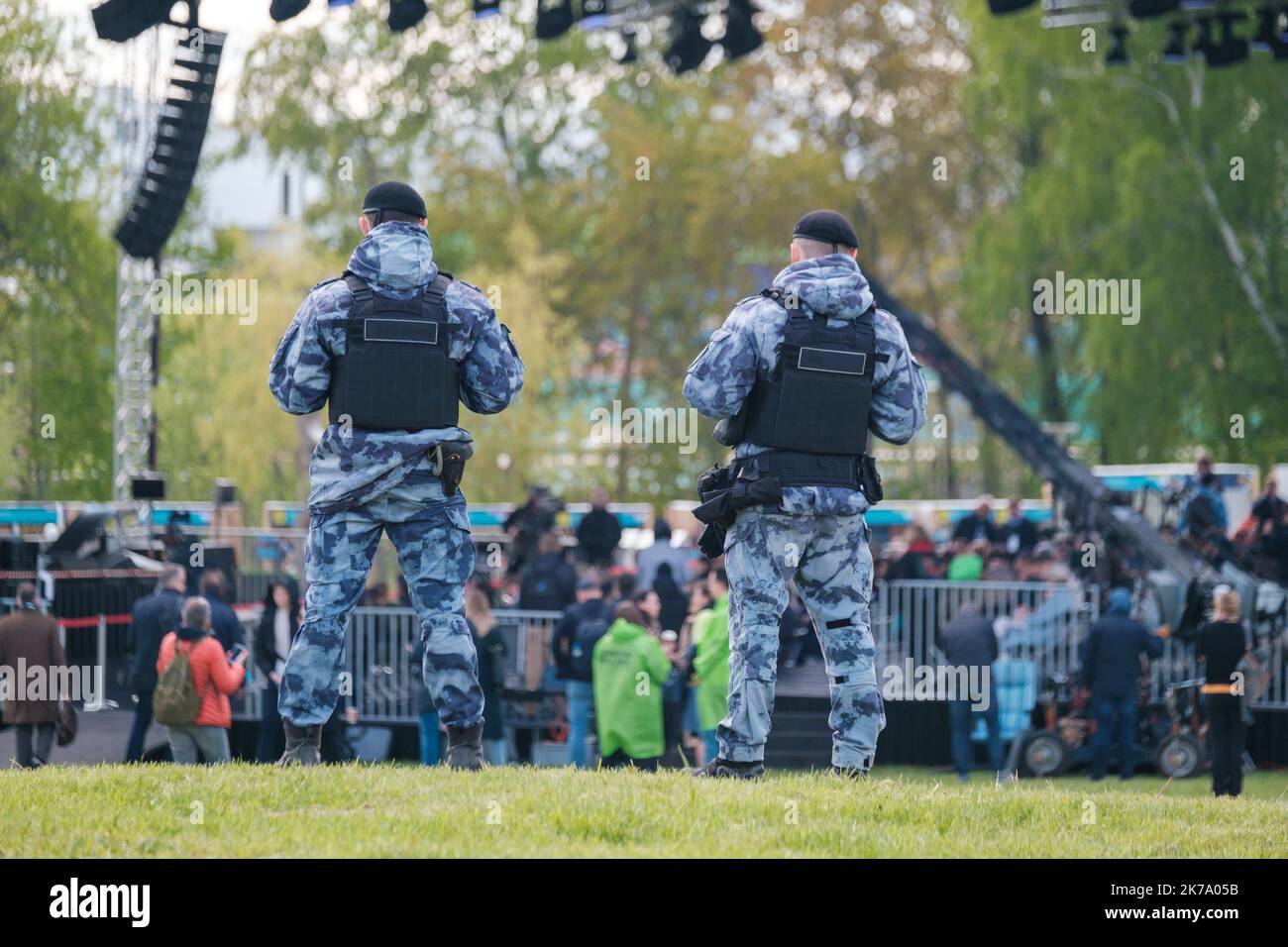 Anonymous police officers during public event Stock Photo