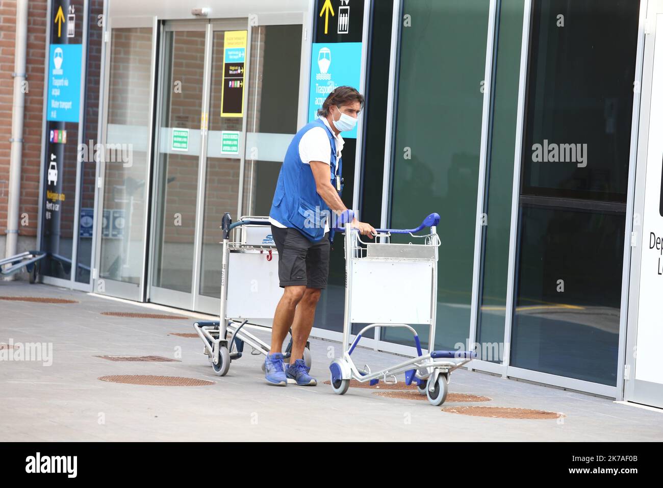 ©Pierre Teyssot/MAXPPP ; Coronavirus Outbreak - Marco Polo Airport on 12th of August 2020, Venice, Italy. A reduction in air traffic and the number of tourists coming by air and transiting through the airport to visit the Serenissima is being observed due to the Covid-19 pandemic. The tourism economy is in deep crisis. Luggage's carrier. Â© Pierre Teyssot / Maxppp  Stock Photo