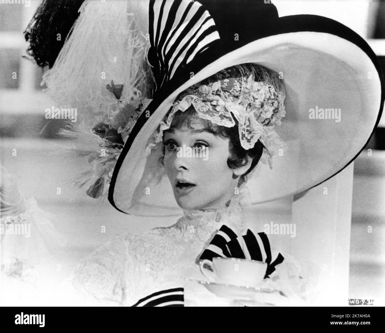 AUDREY HEPBURN as Eliza Doolittle in MY FAIR LADY 1964 director GEORGE CUKOR from the Broadway musical adapted from the play Pygmalion by George Bernard Shaw screenplay book and lyrics Alan Jay Lerner music Frederick Loewe production design and costumes Cecil Beaton producer Jack L. Warner Warner Bros. Stock Photo
